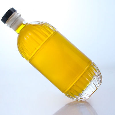 Botella de vidrio para bebidas industriales con diseño en relieve y forma redonda de corcho