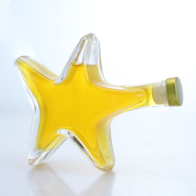 Whiskey Gin Rum Vodka Botella de vidrio de licor en forma de estrella con tapa de corcho y base de vidrio