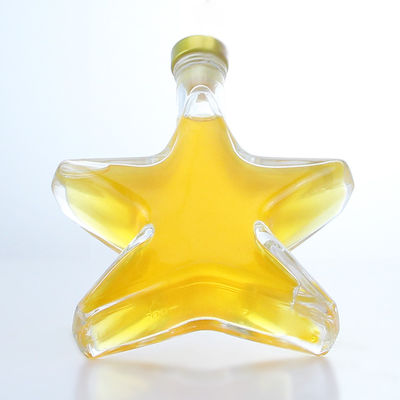 Whiskey Gin Rum Vodka Botella de vidrio de licor en forma de estrella con tapa de corcho y base de vidrio