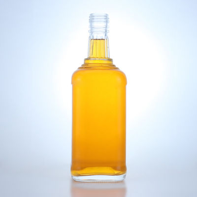 Botella de vidrio con tapa cuadrada para whisky vodka tequila gin ron logotipo personalizado