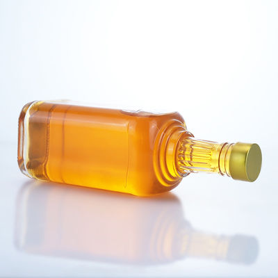 Botella de vidrio con tapa cuadrada para whisky vodka tequila gin ron logotipo personalizado