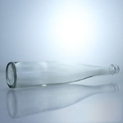 Contenedor de bebidas Botella de vidrio de sílex de alta y delgada con tapa de tornillo