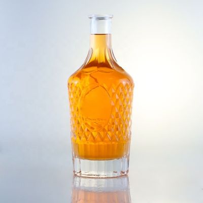 2023 Botellas de vidrio transparentes Botellas de bebida de vidrio con material base congelado Logotipo personalizado