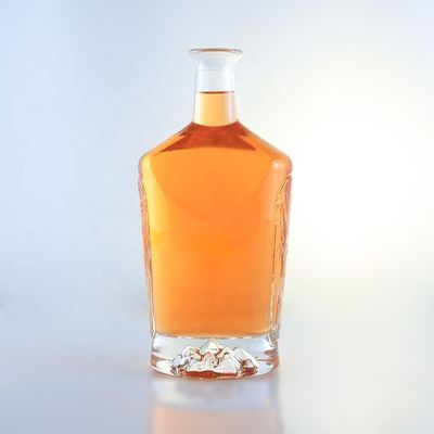 2023 Botellas de vidrio transparentes Botellas de bebida de vidrio con material base congelado Logotipo personalizado