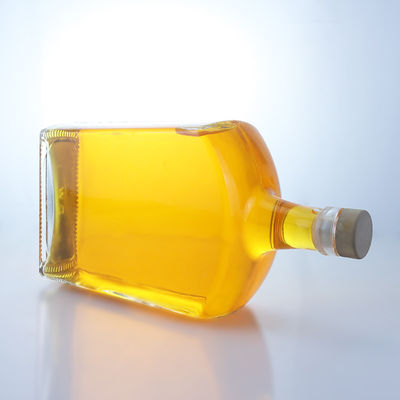 Botella de vidrio de forma plana para whisky, vodka, tequila, ginebra y ron hecha de vidrio