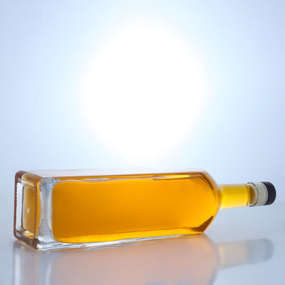 Botella de vidrio de sílex de forma cuadrada en color claro para vodka whisky tequila gin