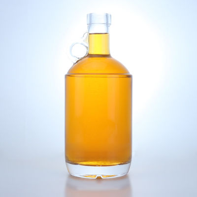 Botella de 750 ml de bebidas alcohólicas de vidrio para vodka, ron y tequila con mango de anillo en el cuello y tapa de corcho