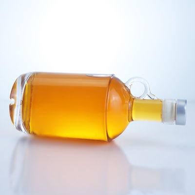 Botella de 750 ml de bebidas alcohólicas de vidrio para vodka, ron y tequila con mango de anillo en el cuello y tapa de corcho