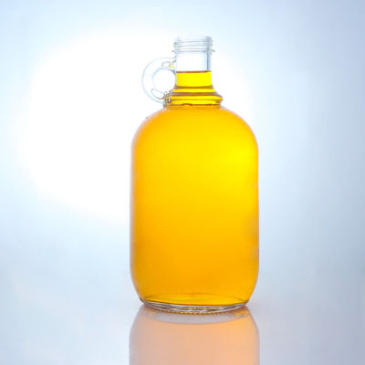 Logotipo personalizado Botella de vidrio de licor de forma redonda con mango y tapa de tornillo