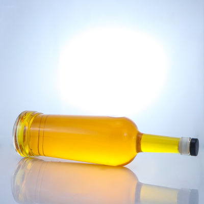 Base de vidrio Forma redonda Logotipo personalizable Cuello largo Botella de licor con corcho