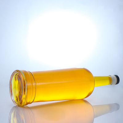 Base de vidrio Forma redonda Logotipo personalizable Cuello largo Botella de licor con corcho