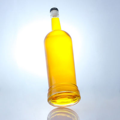 Base de vidrio Forma redonda Logotipo personalizable Cuello largo Botella de licor con corcho