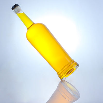 Base de vidrio Forma redonda Logotipo personalizable Cuello largo Botella de licor con corcho