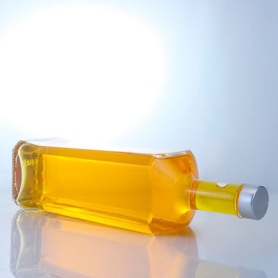 Botella de vidrio hecha de material de cuello claro o personalizado para ron vodka whisky tequila gin