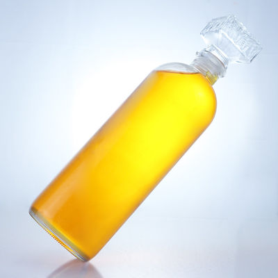 Botella de vidrio de forma redonda para ron, vodka, whisky, tequila y ginebra