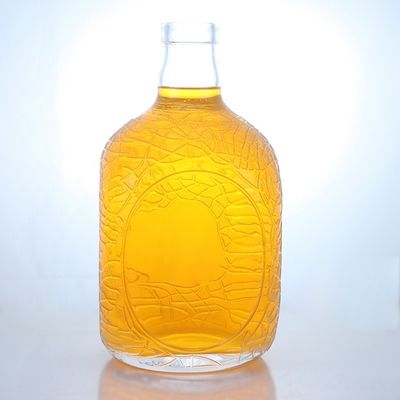Forma redonda única en relieve de calidad alimentaria ron vodka whisky tequila ginebra botella de vidrio con corcho perfecto
