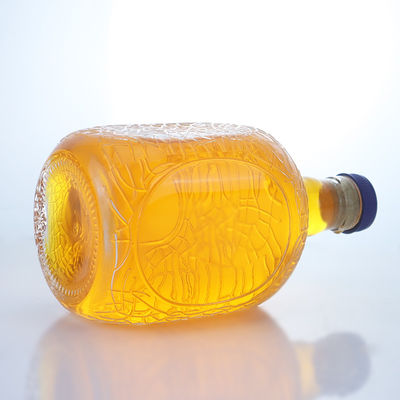 Forma redonda única en relieve de calidad alimentaria ron vodka whisky tequila ginebra botella de vidrio con corcho perfecto
