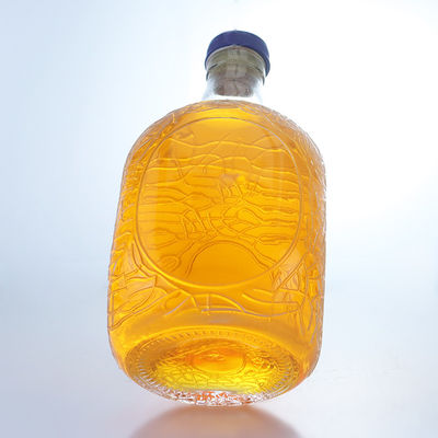 Forma redonda única en relieve de calidad alimentaria ron vodka whisky tequila ginebra botella de vidrio con corcho perfecto