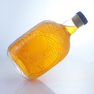 Forma redonda única en relieve de calidad alimentaria ron vodka whisky tequila ginebra botella de vidrio con corcho perfecto