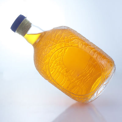 Forma redonda única en relieve de calidad alimentaria ron vodka whisky tequila ginebra botella de vidrio con corcho perfecto
