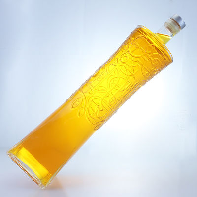 Botella de vidrio de licor industrial con forma única y material de súper sílex en relieve