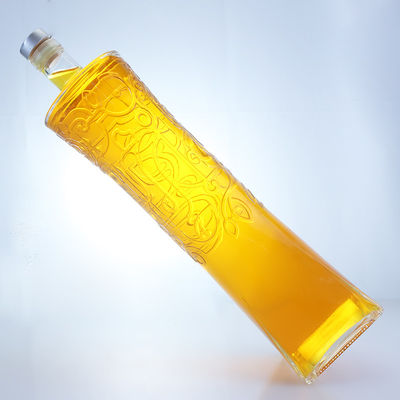 Botella de vidrio de licor industrial con forma única y material de súper sílex en relieve