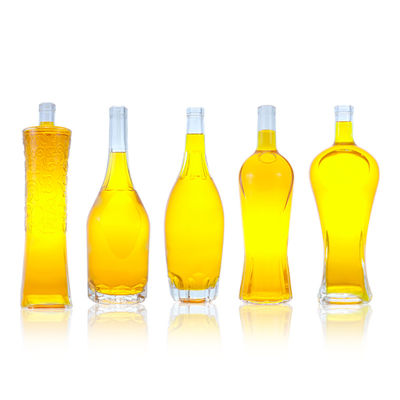 Botella de vidrio con tapa personalizada de 500 ml 700 ml 750 ml de forma única para ron vodka whisky tequila gin