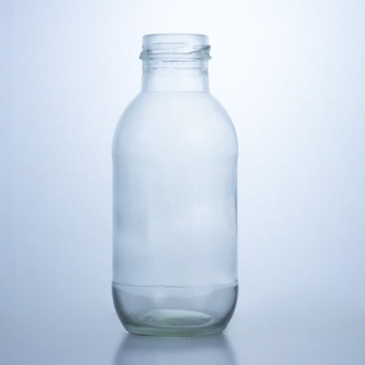 Botella de leche de vidrio redonda de 300 ml con tapa Solución de almacenamiento de licor Manipulación de la superficie decal