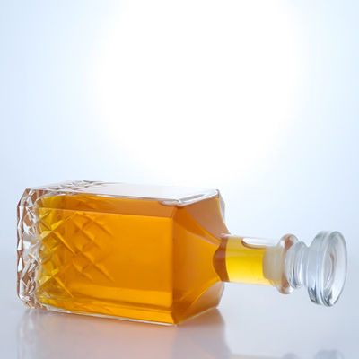 Botella de vidrio polígono personalizada para vodka whisky gin ron espíritu