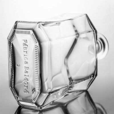 Botella de licor de vidrio poligonal única o personalizada para whisky, ginebra, ron y vodka 1000 ml