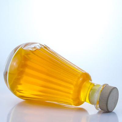 Botella redonda de vidrio con tapa de corcho y logotipo personalizado para ron vodka whisky tequila gin