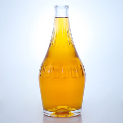 Botella de vidrio de sílex de diseño elegante de 700 ml para champán de forma única y vacía