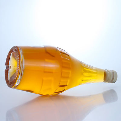 Botella de vidrio de sílex de diseño elegante de 700 ml para champán de forma única y vacía