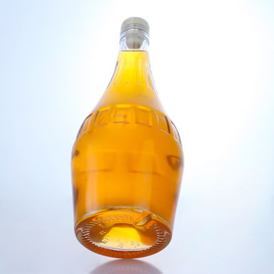 Botella de vidrio de sílex de diseño elegante de 700 ml para champán de forma única y vacía
