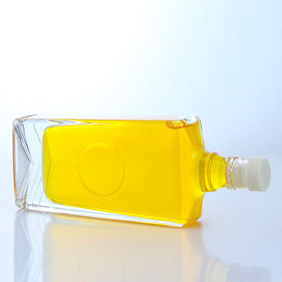 Liquor industrial botella de vidrio cuadrada con tapa de guala y capacidad personalizable
