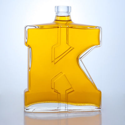 Botella de vidrio de sílex de 750 ml con forma única para Gin Rum Champagne Brandy Whisky