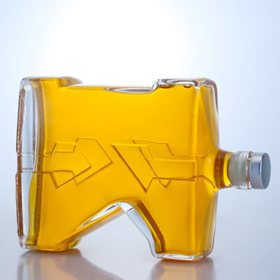 Botella de vidrio de sílex de 750 ml con forma única para Gin Rum Champagne Brandy Whisky