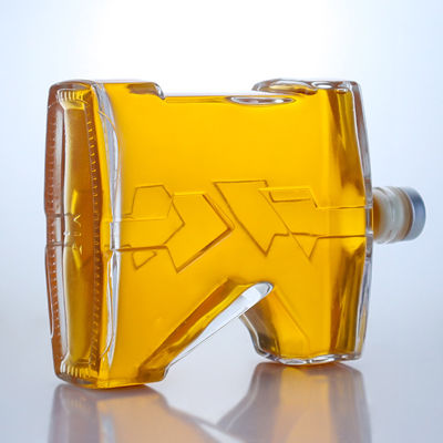 Botella de vidrio de sílex de 750 ml con forma única para Gin Rum Champagne Brandy Whisky