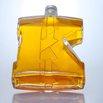 Botella de vidrio de sílex de 750 ml con forma única para Gin Rum Champagne Brandy Whisky