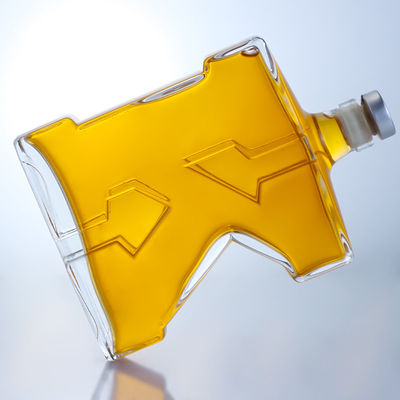 Botella de vidrio de sílex de 750 ml con forma única para Gin Rum Champagne Brandy Whisky