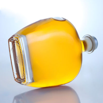 Botella de vidrio de forma redonda y clara para Gin Rum Champagne Brandy Whisky 700 ml