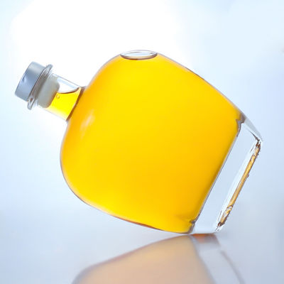 Botella de vidrio de forma redonda y clara para Gin Rum Champagne Brandy Whisky 700 ml