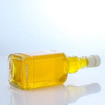 Botella transparente de vidrio de piedra para whisky vodka champán tequila gin ron