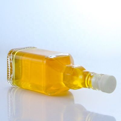 Botella transparente de vidrio de piedra para whisky vodka champán tequila gin ron