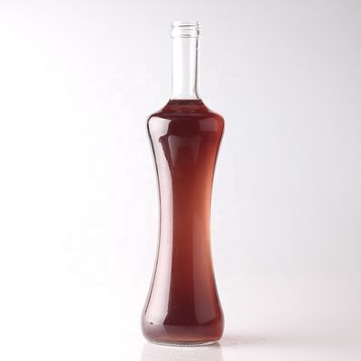 Botella de vidrio de 500 ml 750 ml 1000 ml para tequila con material de cuerpo transparente personalizado