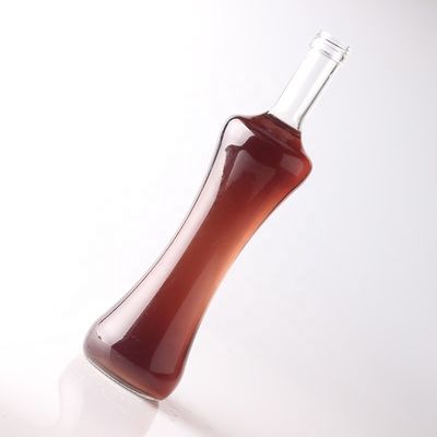 Botella de vidrio de 500 ml 750 ml 1000 ml para tequila con material de cuerpo transparente personalizado