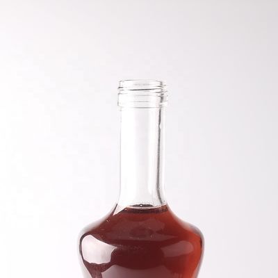 Botella de vidrio de 500 ml 750 ml 1000 ml para tequila con material de cuerpo transparente personalizado