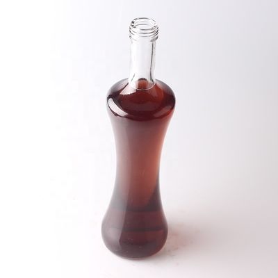 Botella de vidrio de 500 ml 750 ml 1000 ml para tequila con material de cuerpo transparente personalizado
