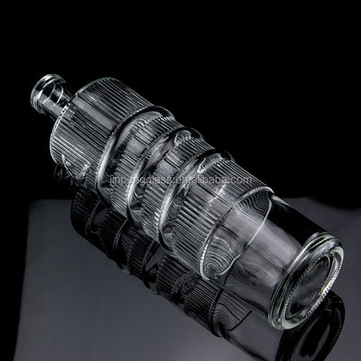 Botella de vidrio en relieve de lujo 750ml 1000ml Limpio Flint Gin Rum Champagne Tequila Botella de whisky con corcho