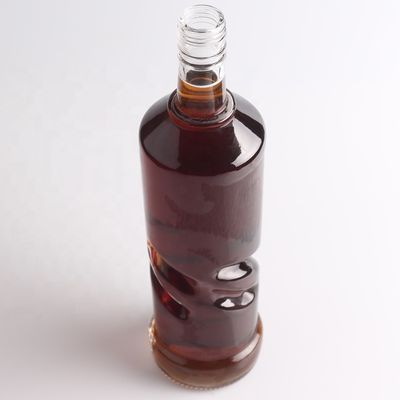 2022 Botella de vidrio de fondo grueso en relieve de piedra clara para ginebra whisky ron tequila brandy